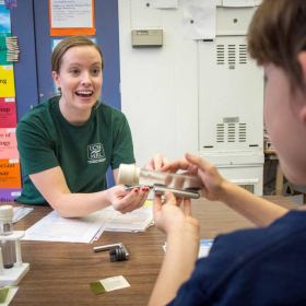 2016 It's a Material World: Katie explaining ferrofluids at Brandon School.